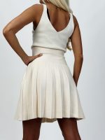 Fustă plisată din jerse cu butoni aurii - imagine 5