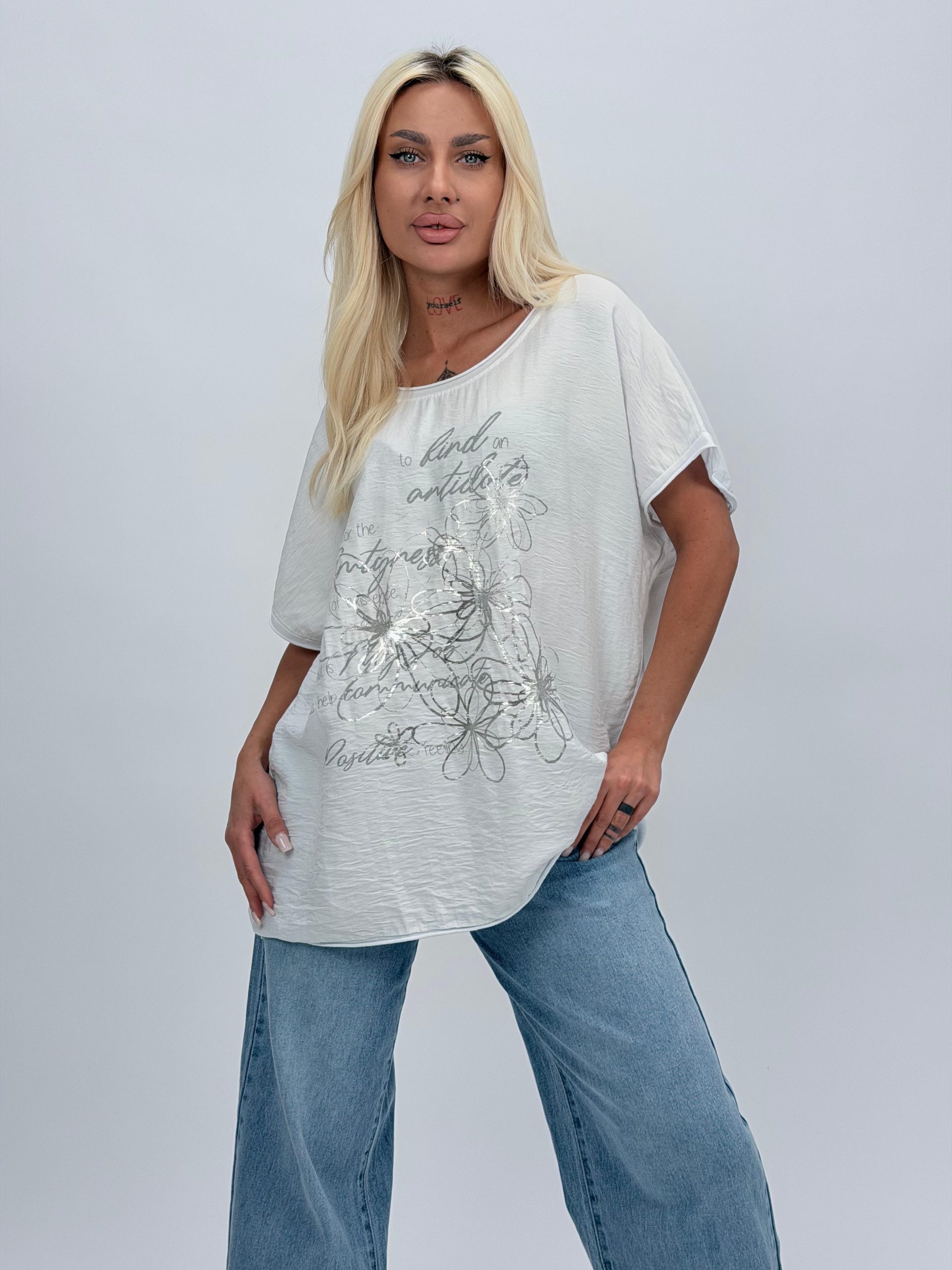 959a4e1b-3b2a-4c6c-b9e4-33015ed53007 Bluză din bumbac cu imprimeu floral - imagine 1