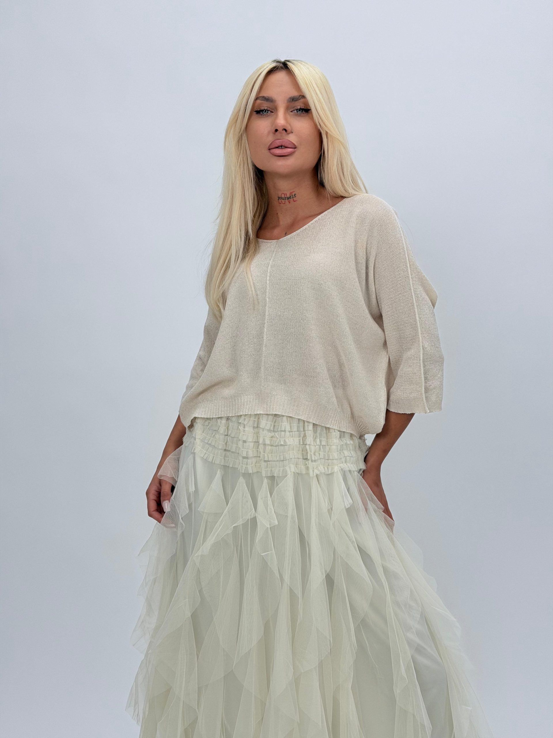 e7700750-c739-4571-b5c5-67d731359494 Bluză scurtă tip raglan cu lurex - imagine 1