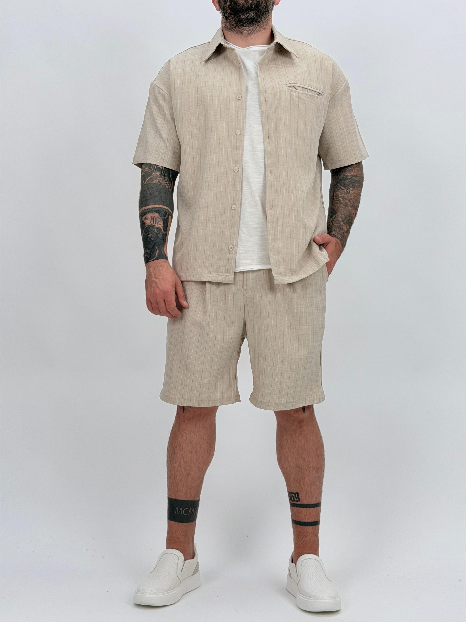 e82e0989-0c3a-4fda-99df-db4995ceaf12 Pantalon 3/4 cu pense și dungi - imagine 1