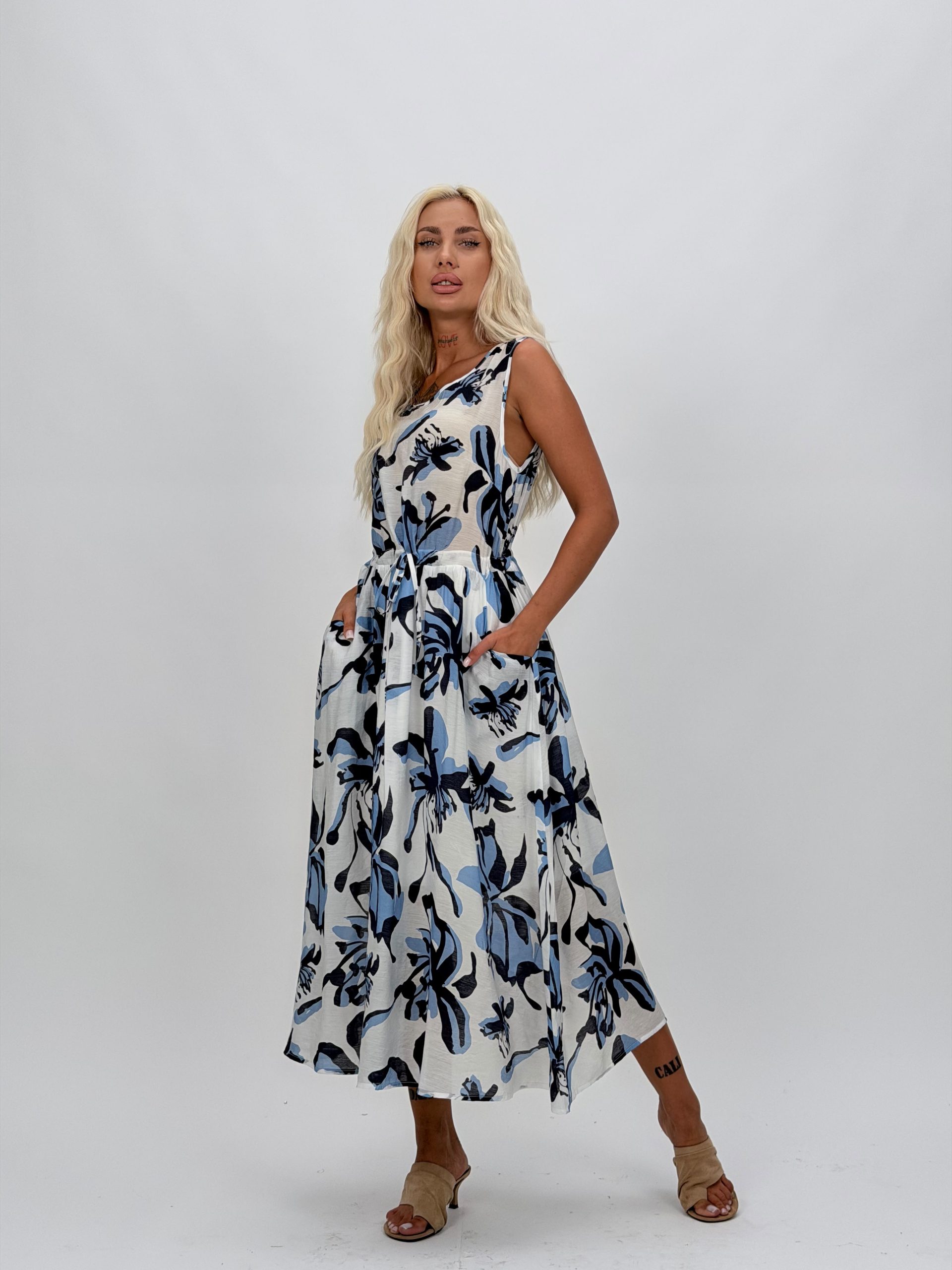 67b5edc3-542f-4435-897d-ca0ff5bba557 Rochie midi cu imprimeu floral și elastic în talie - imagine 1