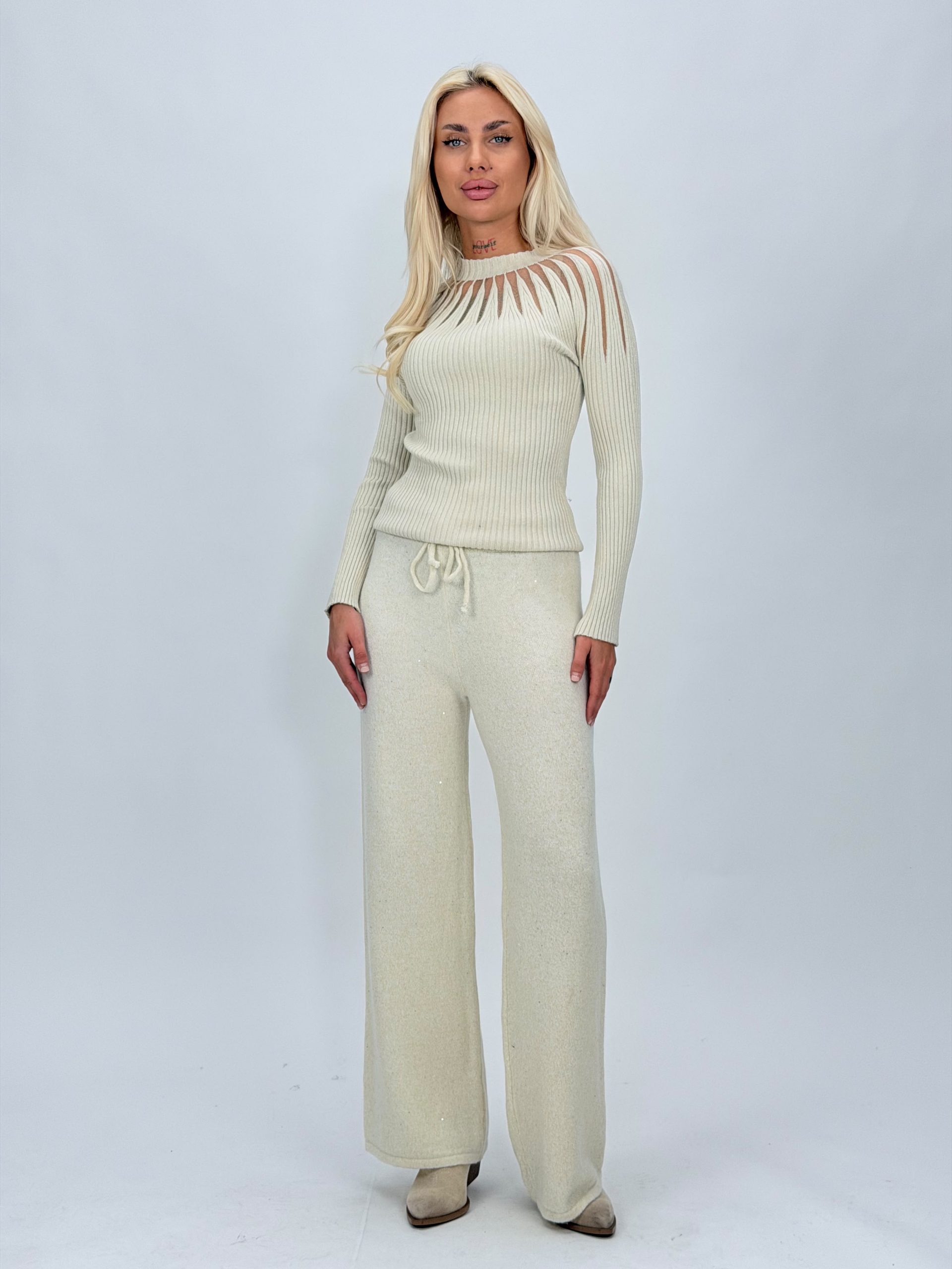 2d291c01-4c84-48d8-8cce-ae143545e576 Pantalon din tricot cu lurex pentru femei, vedere frontală